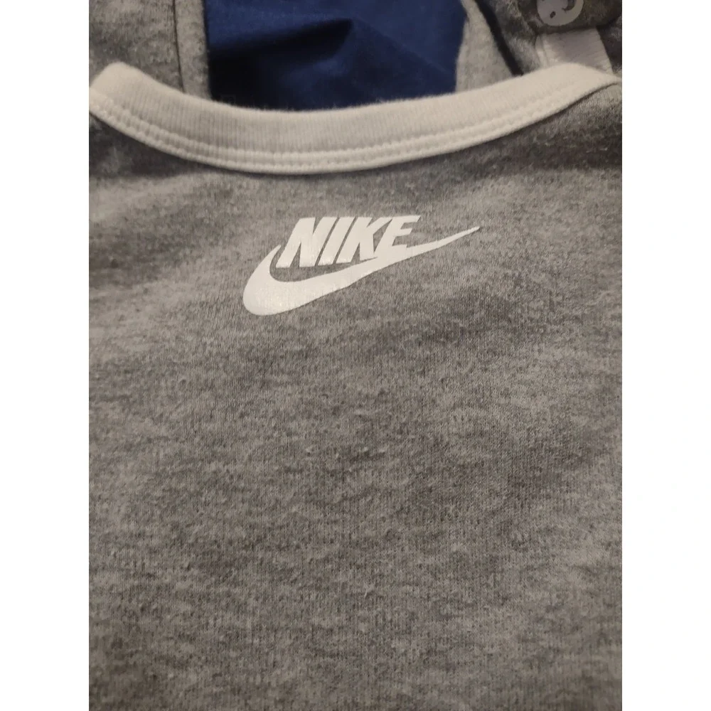 Nike footed baby